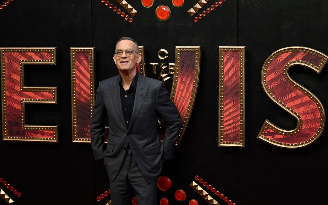 US actor Tom Hanks Tom Hanks poses on the red carpet upon arrival to attend the UK special Screening of Elvis at the BFI Southbank, in London on May 31, 2022. (Photo by JUSTIN TALLIS / AFP)