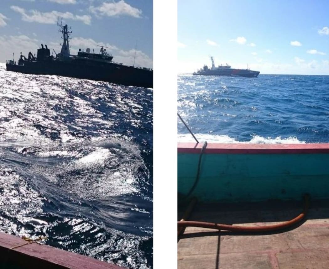 Australian border force ships, viewed from the deck of an asylum seekers’ boat, in May 2015.