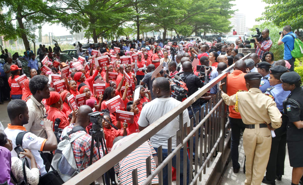 Civil society groups take part in the march in Abuja.