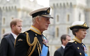 Prince Harry, King Charles III and Princess Anne follow Queen Elizabeth II's coffin as it arrives at the Committal Service at St George's Chapel, inside Windsor Castle.