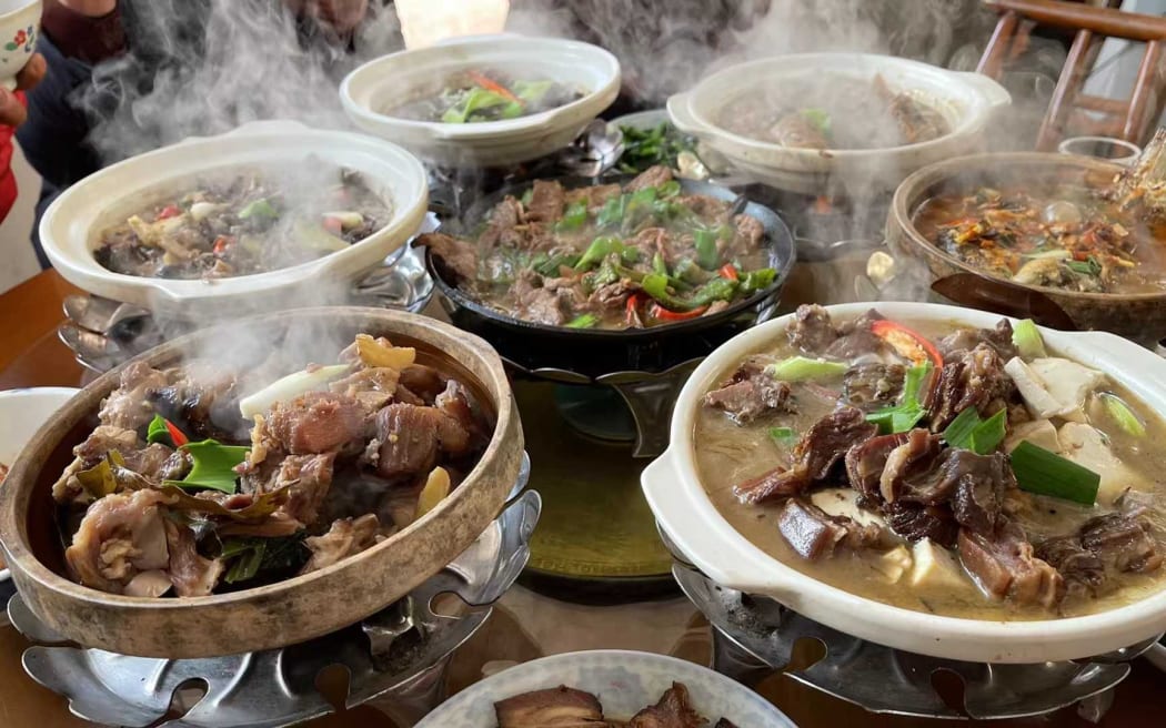 A household in Hunan has their Chinese New Year's Eve dinner.