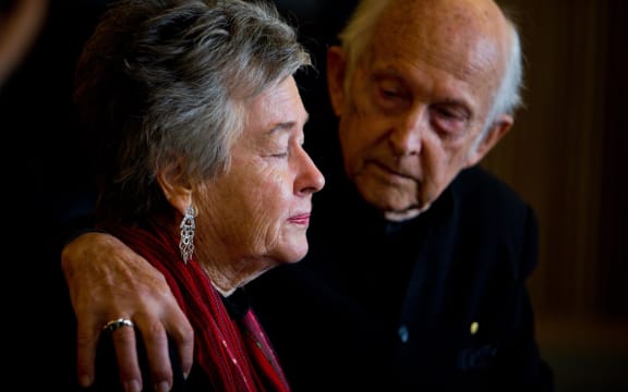 Juris Greste comforts his wife Lois during a news conference on Monday.