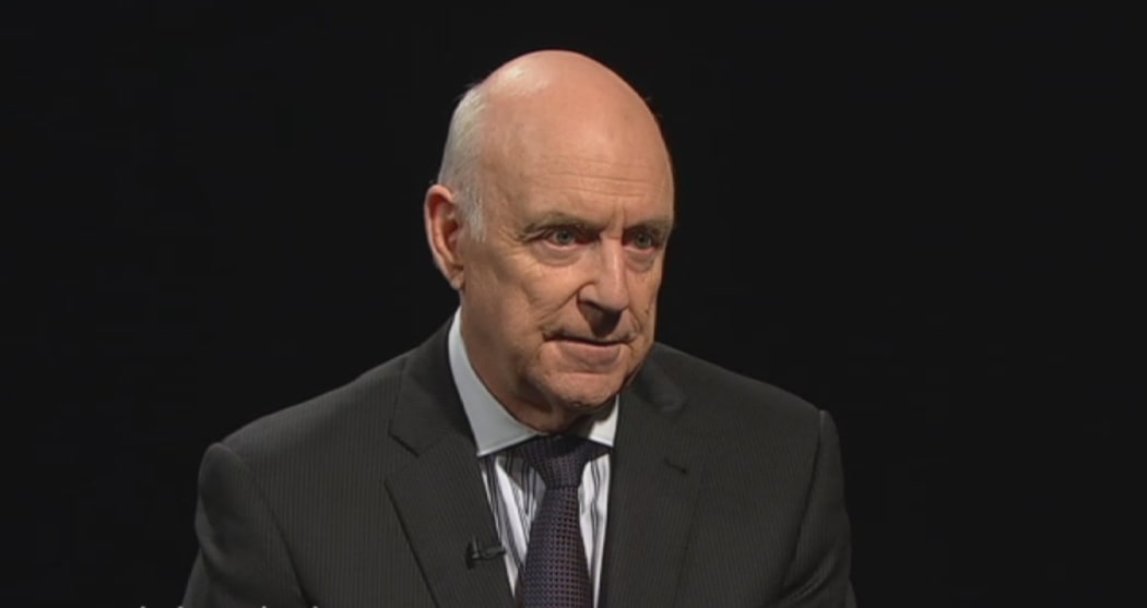 John Clarke as online news director 'Xavier Breth'