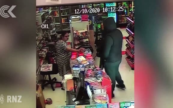 Hastings dairy owner with bat chases off gunman