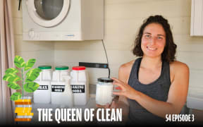 A smiling woman in a laundry room holds a jar of homemade cleaner. Behind her are containers labeled Borax, Washing Soda, and Baking Soda. A cartoon money tree icon and bold text read 'The Queen of Clean – S4 Episode 3' at the bottom of the image.