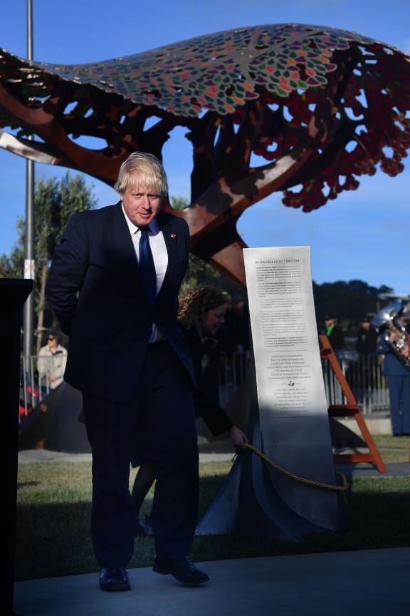 Boris Johnson in front of the Weta Workshop designed statue at the Pukeahu National War Memorial Park.