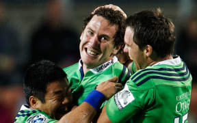 Marty Banks celebrates his match-winning penalty with his Highlanders team-mates