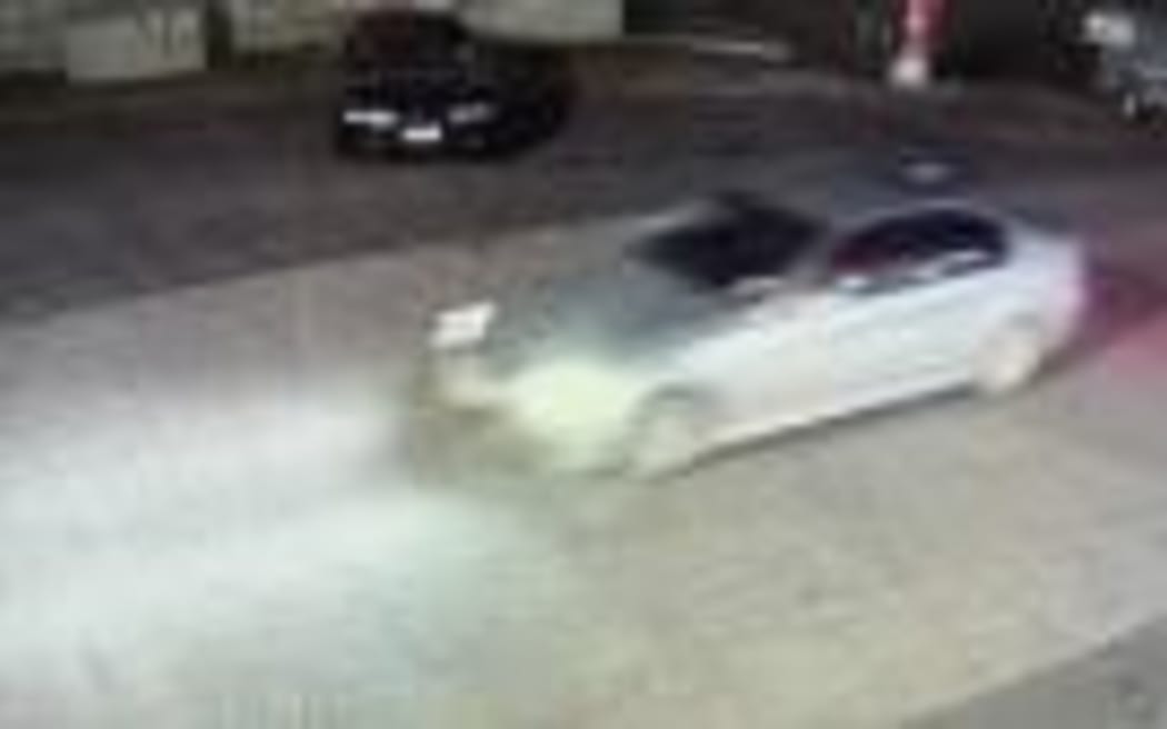 The vehicle in question is described the car as a silver-coloured BMW sedan without either of its number plates, and with a non-working lower-left fog lamp.