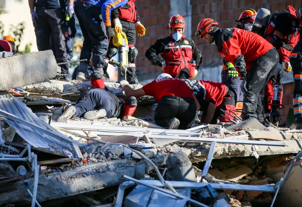IZMIR, TURKEY - OCTOBER 31: Search and rescue works continue at rubbles of a collapsed building after a magnitude 6.6 quake shook Turkey's Aegean Sea coast, in Izmir, Turkey on October 31, 2020.