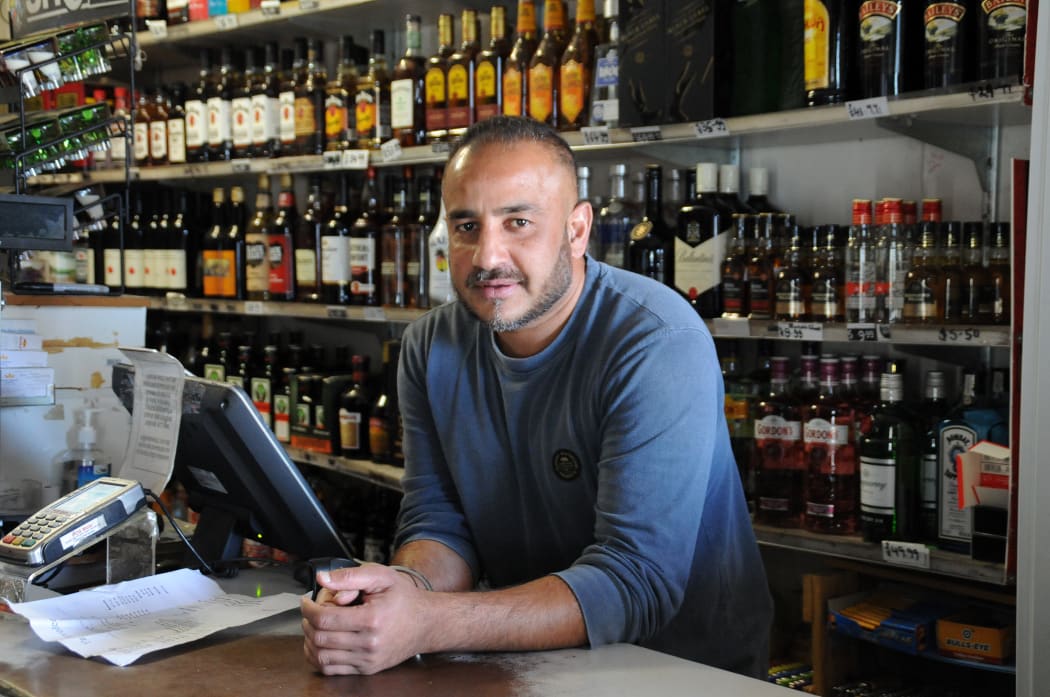 Rowandale Liquor manager Gurmal Singh said he wasn’t even aware of Auckland Council’s signage bylaw and wondered what would be achieved by taking down a sign off the roof of his store.