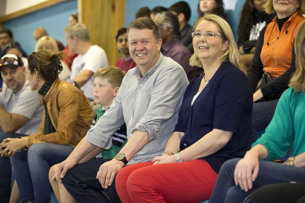 David Cunliffe watches a water polo game with his wife Karen Price on election day.