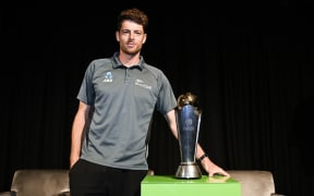 Black Caps captain Mitch Santner with the Champions Trophy.