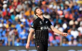New Zealand's Jimmy Neesham reacts to a dropped catch against South Africa in Pune.