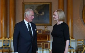 King Charles III speaks with Britain's Prime Minister Liz Truss during their first meeting at Buckingham Palace in London on September 10, 2022.