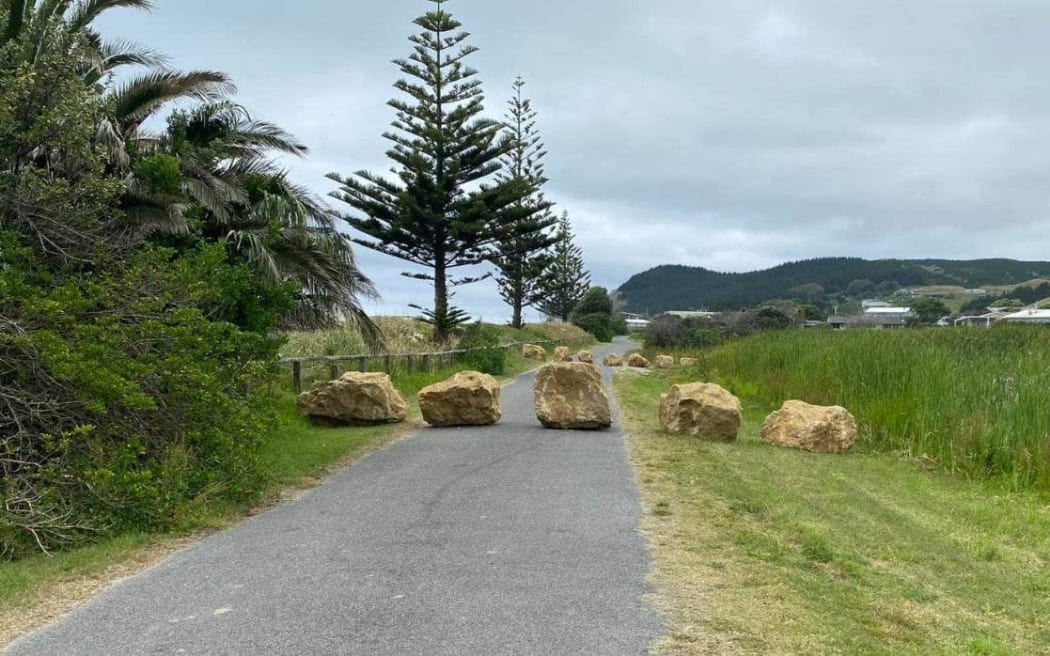 Boulders put on a road crossing private land at Waimārama, near Hastings