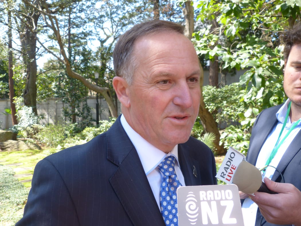 Prime Minister John Key talking to reporters in Japan in Wednesday