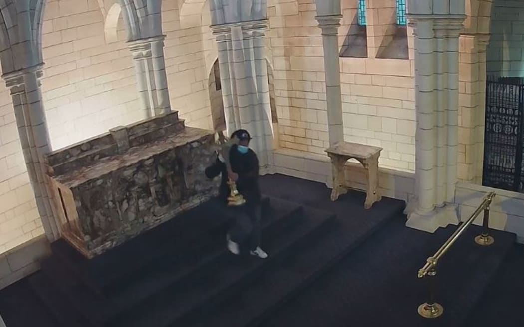 CCTV shows a person walking straight to the high altar on Friday afternoon last week and taking the cross as it was not bolted down.