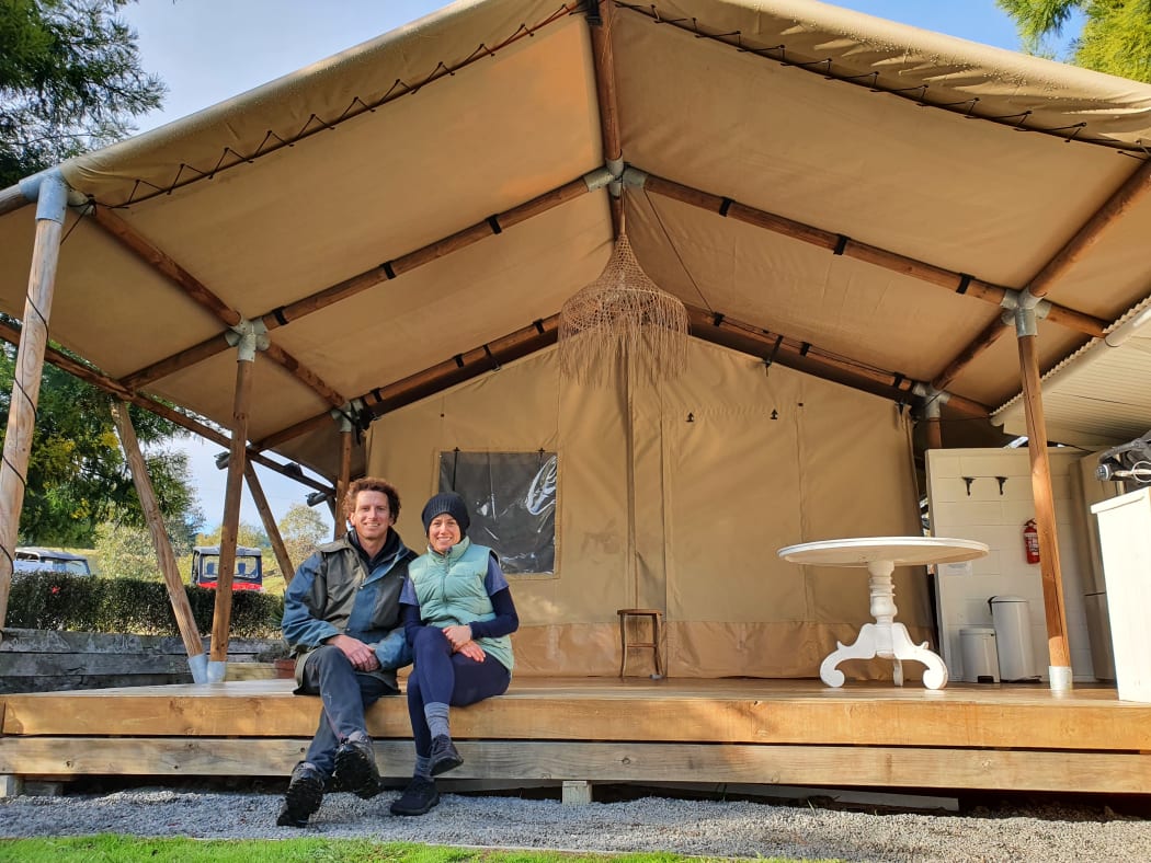 Tom and Lucia Gordon at one of the glamping tents all closed up for the winter