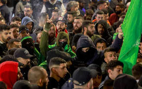 Palestinian Hamas supporters in the West Bank city of Ramallah protest on 2 January, 2024, against a drone strike attributed to Israel which killed Hamas deputy leader Saleh al-Aruri in Beirut.