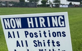 A sign advertising jobs stands near the SMART Alabama, LLC auto parts plant and Hyundai Motor Co. subsidiary, in Luverne, Alabama U.S. July 14, 2022
