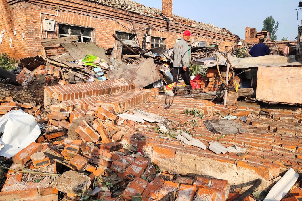 Some of the buildings damaged by a tornado in Kaiyuan, in China's northeastern Liaoning province.