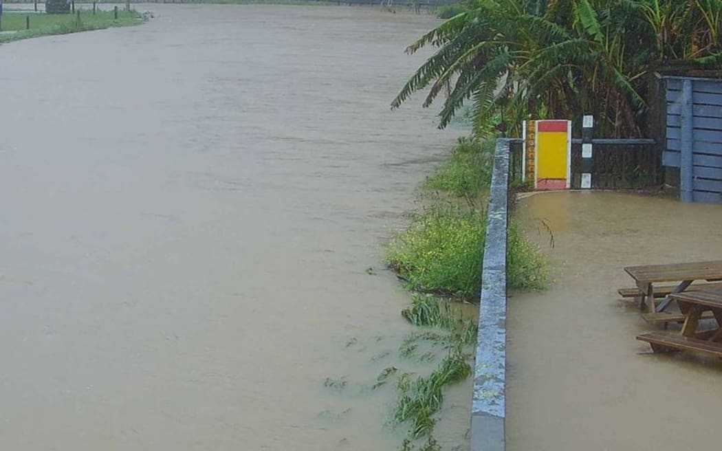 The Northland Regional Council's Kāeo River webcam shows the river is running high but still a few centimetres short of flooding State Highway 10 at 8.58am on 30 October, 2023.