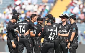 New Zealand's Trent Boult celebrates the wicket of Temba Bavuma (captain) of South Africa during the ICC Men's Cricket World Cup 2023 match between South Africa and New Zealand