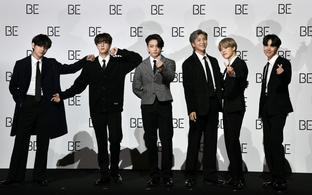 BTS members (L to R) V, Jin, Jung Kook, RM, Jimin and J-Hope pose for a photo session during a press conference on BTS new album 'BE (Deluxe Edition)' in Seoul on November 20, 2020.