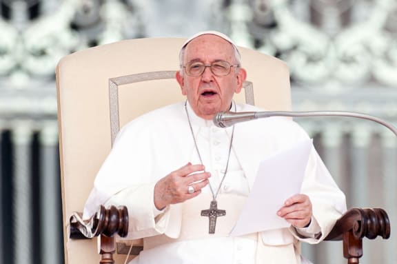 Pope Francis delivers a speech as he leads his weekly general audience in St. Peter s Square.