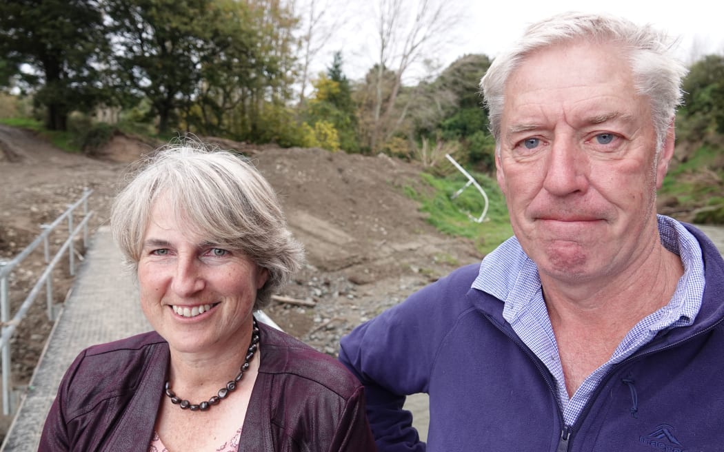Charlie and Hamish Menzies aren't sure when a permanent bridge across the Manawatū River to their property will be built.