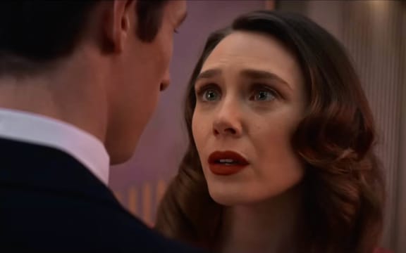Callum Turner as Luke and Elizabeth Olsen as Joan in the 2025 film, Eternity, directed by David Freyne.