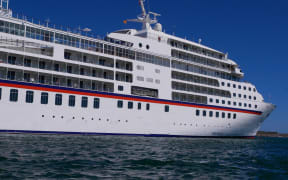 Beautiful photo of a white cruise ship on the Mediterranean Sea