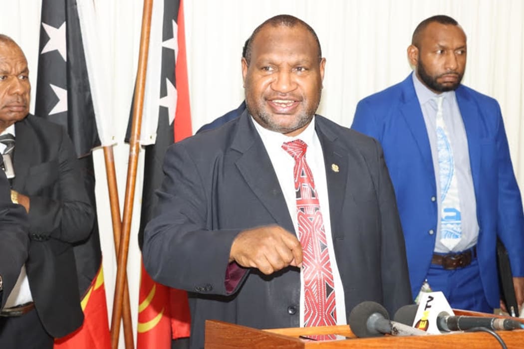 Papua New Guinea Prime Minister James Marape (centre) June 2020.