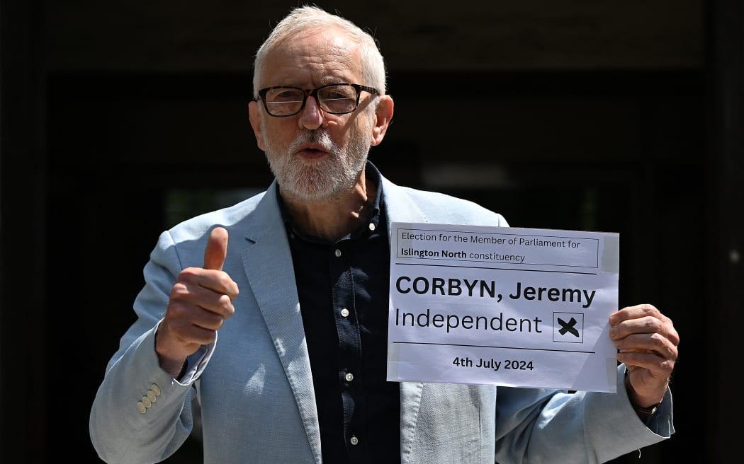 Britain's former Labour Party leader Jeremy Corbyn poses outside Islington Town Hall in London on June 5, 2024 after submitting his nomination papers to officially stand as an Independent candidate in Islington North for the July 4 general election. (Photo by JUSTIN TALLIS / AFP)