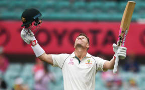 Australia's David Warner celebrates.