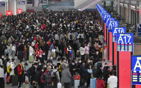 Passengers are seen at Shenzhen North Railway Station in Shenzhen, south China's Guangdong Province, 7 January 2023. The 40-day Spring Festival travel rush in China kicked off Saturday.