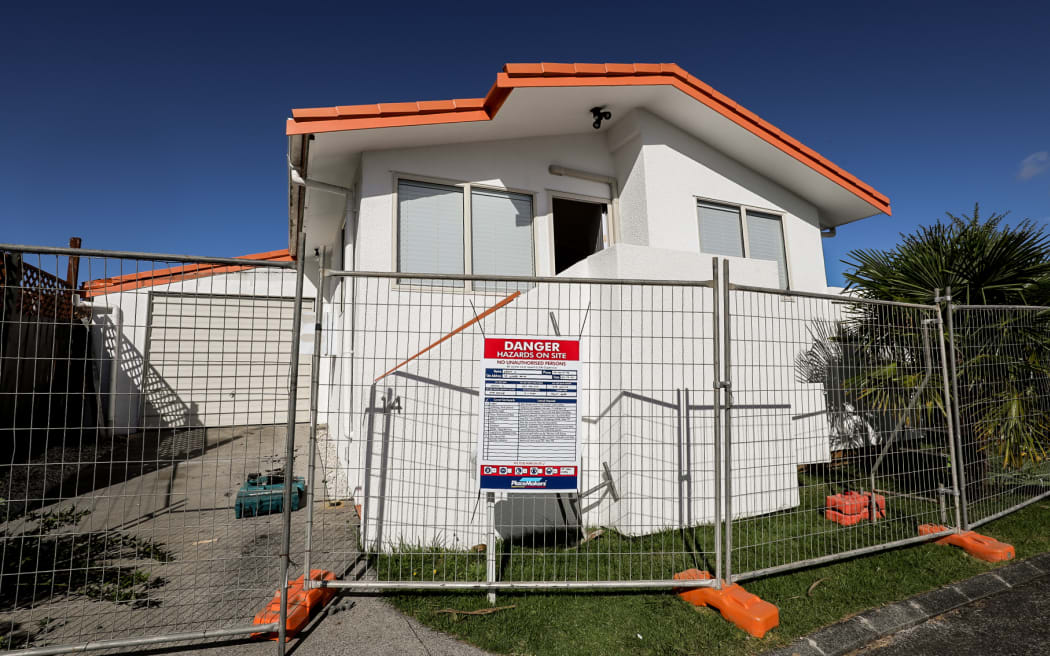 Close to 50 homes in an Auckland suburb are being compulsorily bought to make way for new flood plains and uncover a buried stream