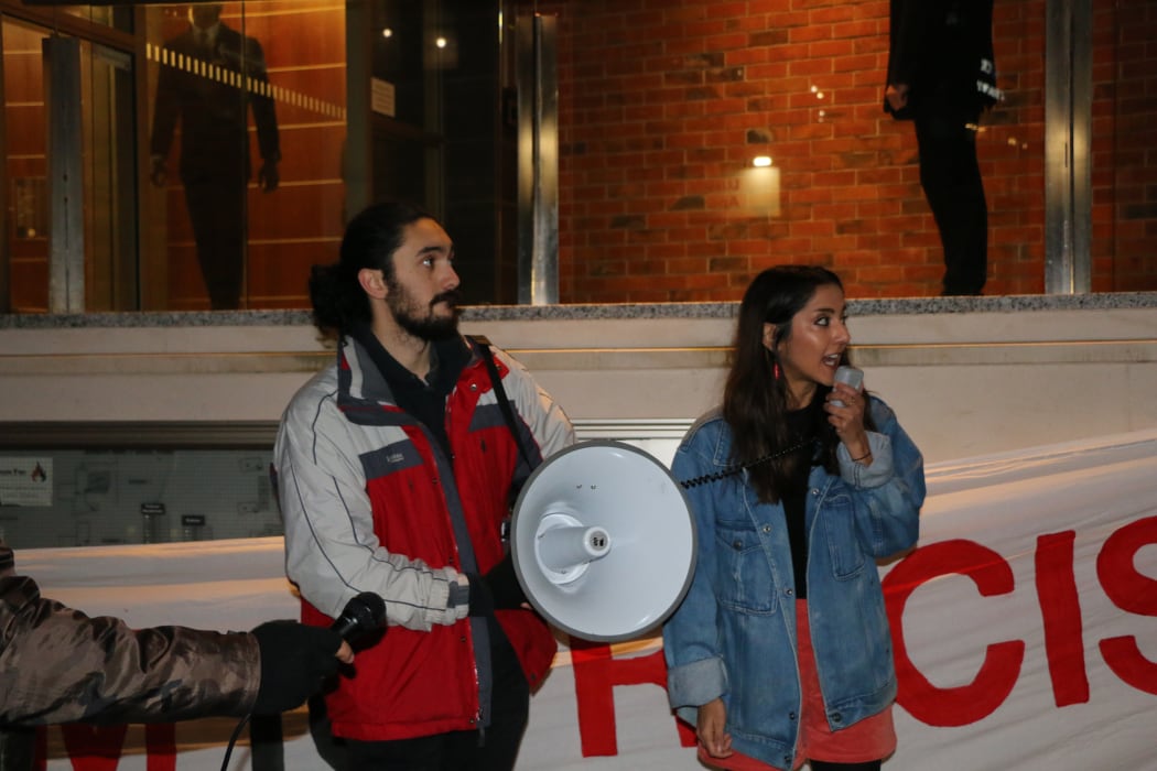 Protesters at Nigel Farage even, including Green MP Golriz Ghahraman (R).