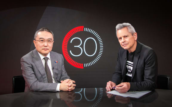 Chinese ambassador Wang Xiaolong in studio for '30 with Guyon Espiner'.