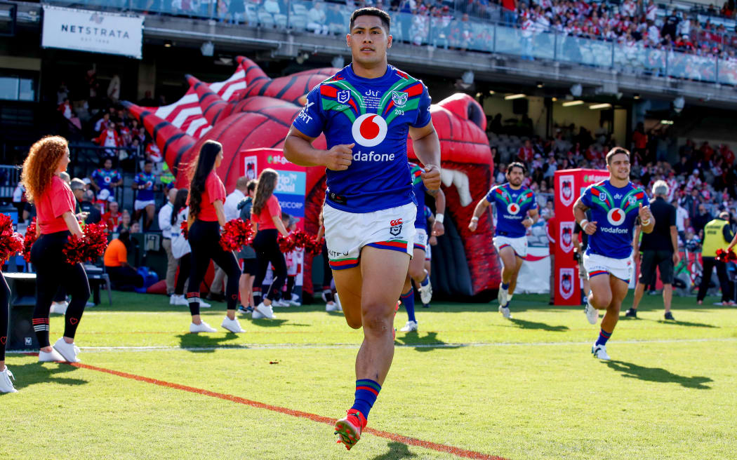 Roger Tuivasa-Sheck leads the Warriors out on his 100th game for the club.