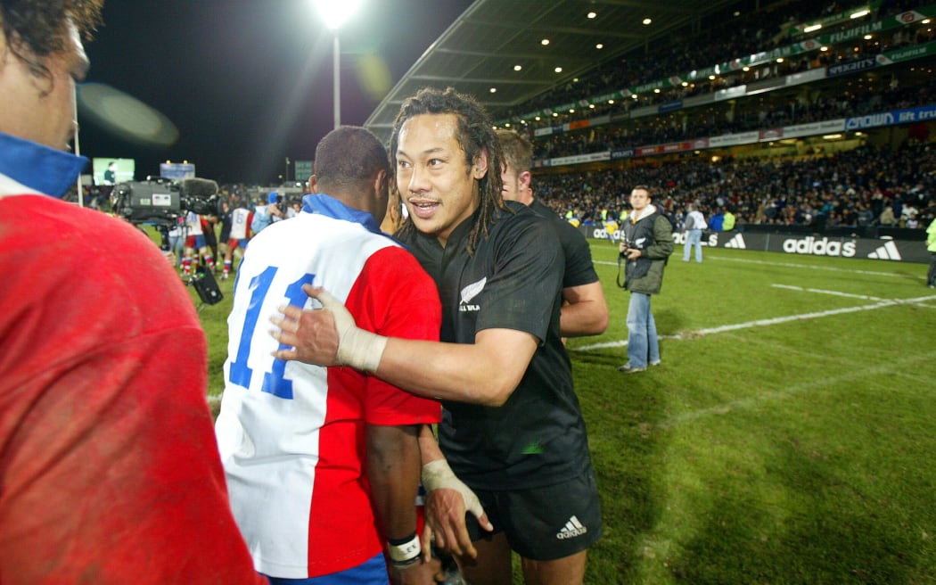 Tana Umaga during the All Blacks Test match against the Pacific Islanders at North Harbour Stadium, Auckland, New Zealand, on Saturday 10 June, 2004. The All Blacks defeated the Pacific Islanders,
PHOTO: Andrew Cornaga/PHOTOSPORT
