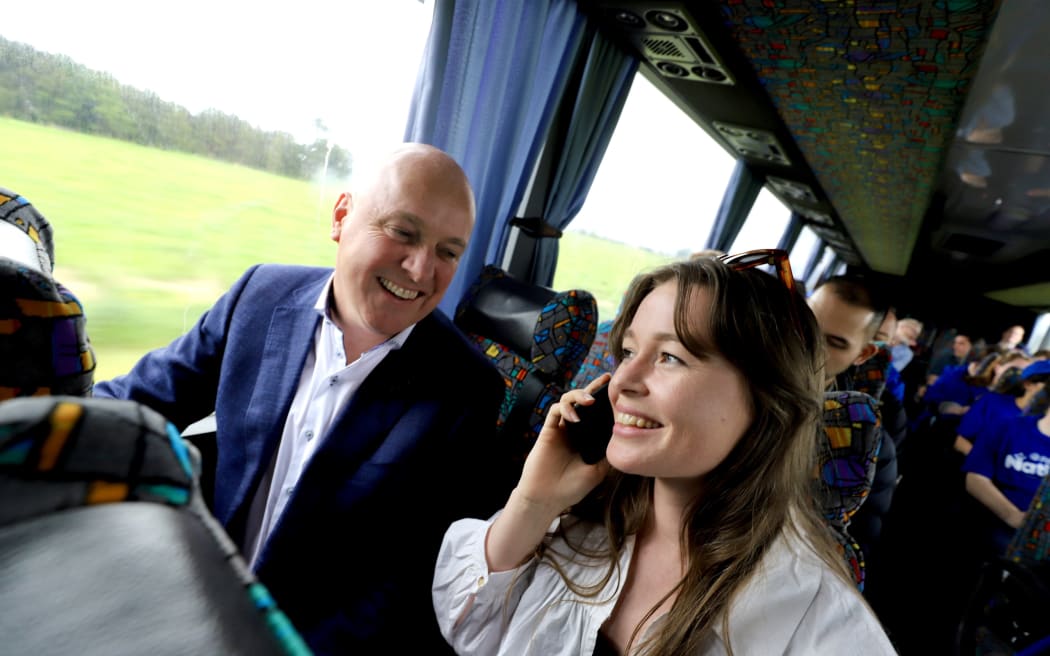 Christopher Luxon and RNZ reporter Anneke Smith on National's campaign bus.