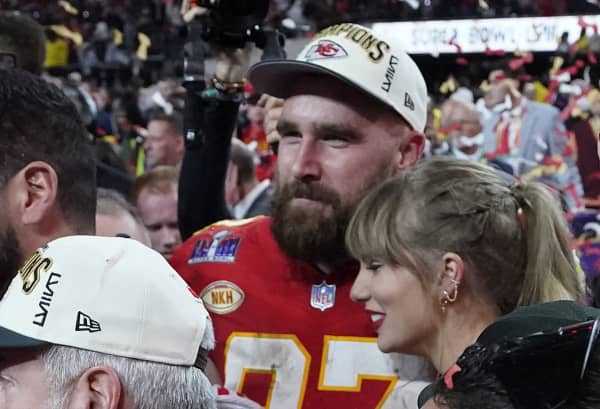 US singer-songwriter Taylor Swift and Kansas City Chiefs' tight end #87 Travis Kelce embrace after the Chiefs won Super Bowl LVIII against the San Francisco 49ers at Allegiant Stadium in Las Vegas, Nevada, February 11, 2024. (Photo by Patrick T. Fallon / AFP)
