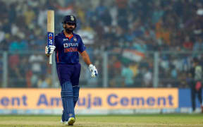 Rohit Sharma of India celebrating his half century.