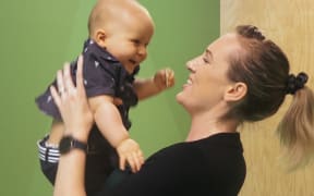 Tabitha with her baby son Oscar, who could be autistic.