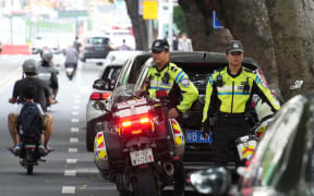 Police officers are on the lookout around a Japanese school in Shenzhen, Guangdong, China, on September 20, 2024. A Chinese man stabbed a 10-year-old Japanese boy on his way to his school on the 18th, and the boy unfortunately lost his life the following day. ( The Yomiuri Shimbun ) (Photo by Ichiro OHARA / Yomiuri / The Yomiuri Shimbun via AFP)