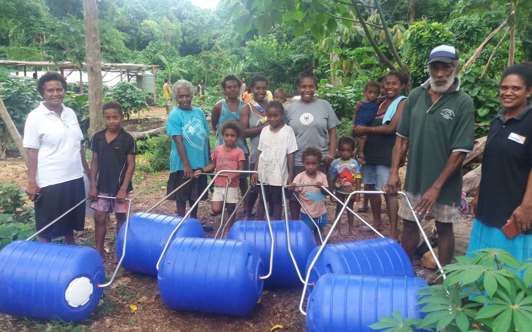 World Vision supported more than 180 households recently affected by the Ambae volcano evacuation in Vanuatu, with hippo rollers - a safe and effective way for families to collect and store water.