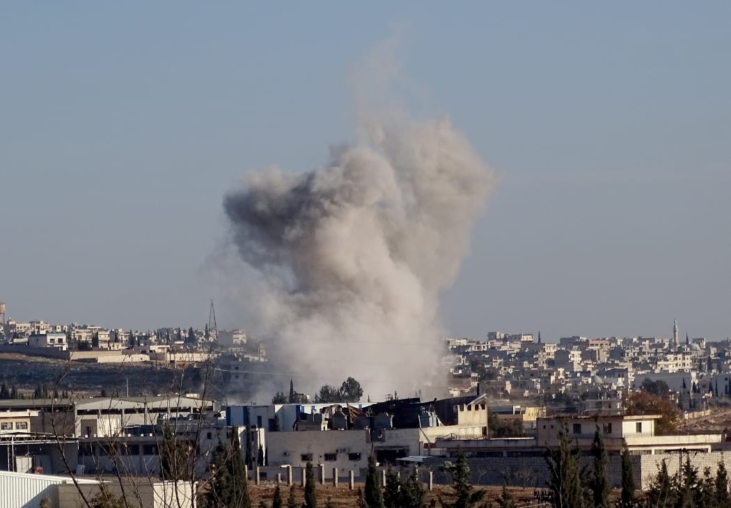 Smoke rises after Russian airstrikes in Aleppo on February 9.