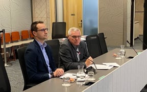 Electoral Officer Dale Ofsoske (right) addresses Whangārei District Council's meeting this week supported by fellow electoral office Ben Roser (left).