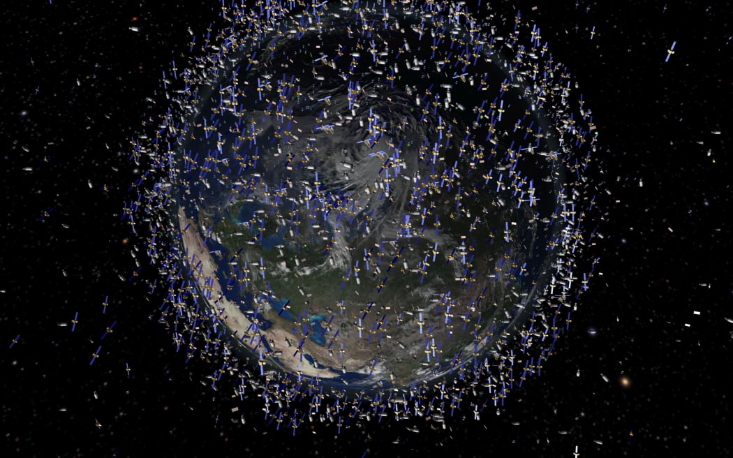 An artist's illustration of the huge numbers of satellites and space debris in orbit (via the European Space Agency)